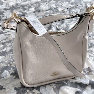 Brand new coach bag   .color off white , short and long straps